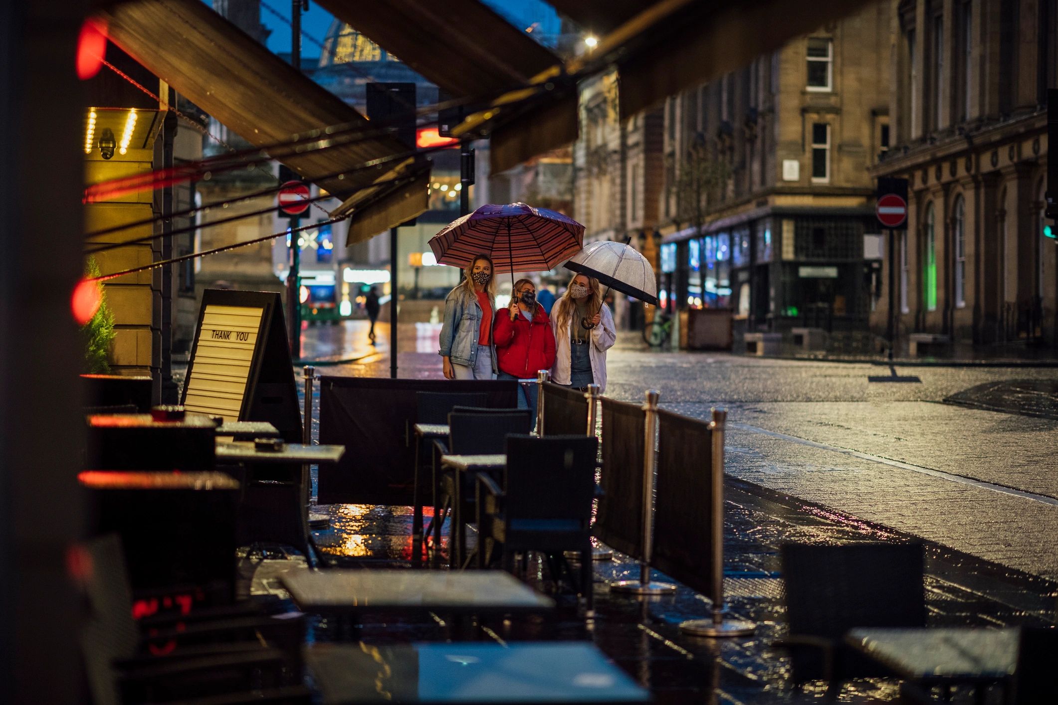 People walking through a city center