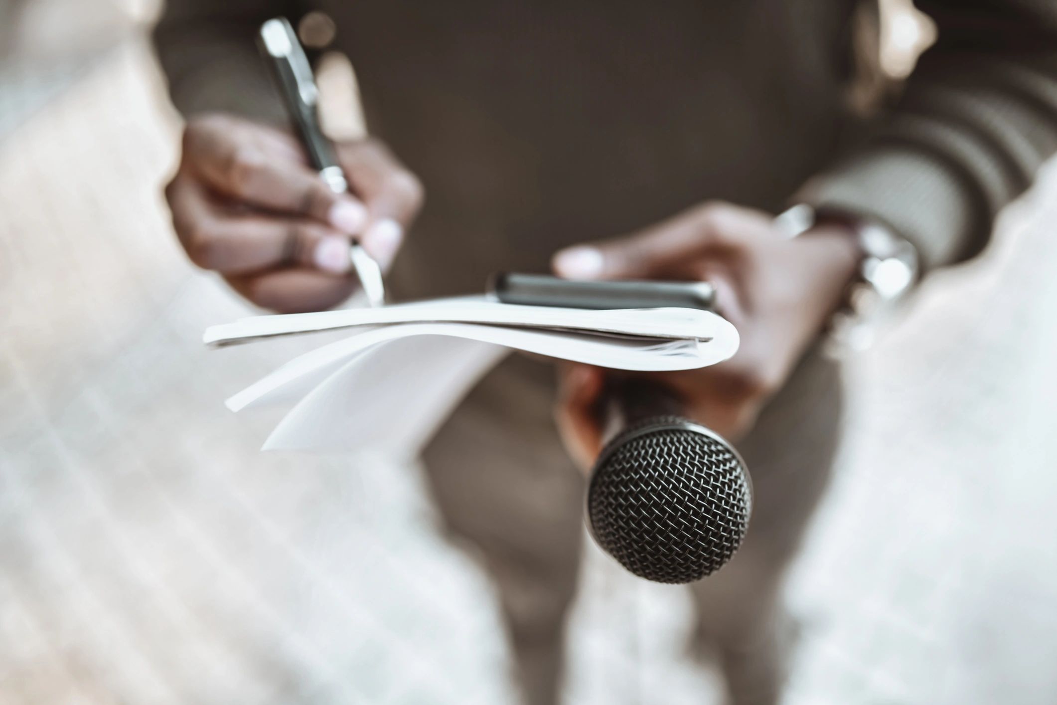 Journalist preparing questions and notes