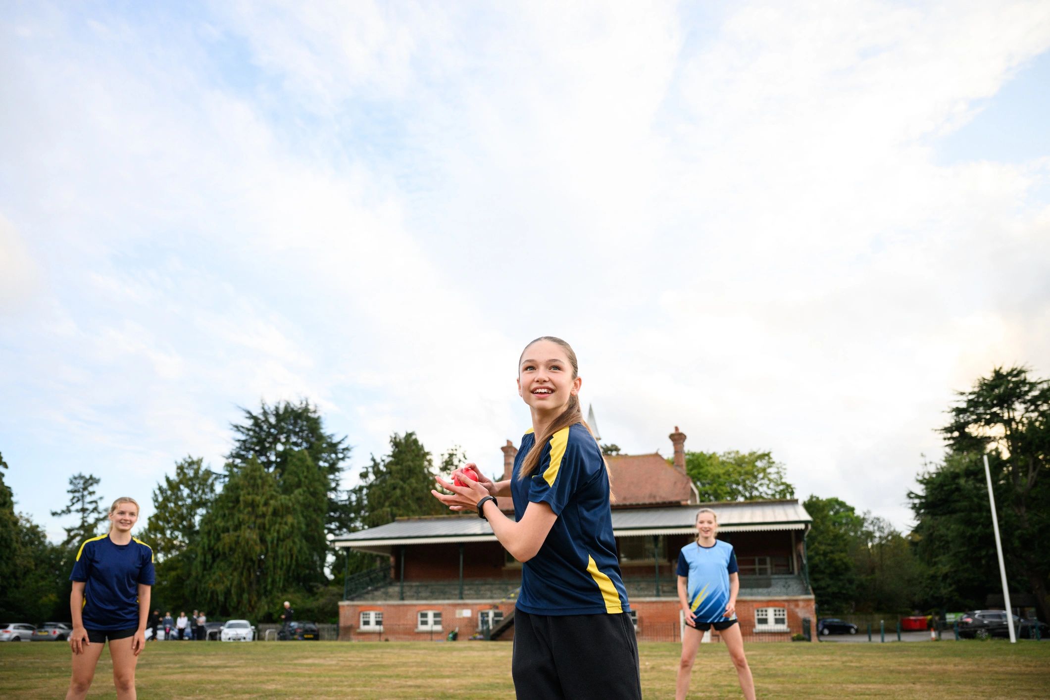 Cricket practice on a field with players in action